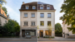 Vorher-Nachher-Vergleich eines Bestandsgebäudes bei der Umwandlung von Gewerbe zu Wohnraum mit KfW 266 in Freiburg
